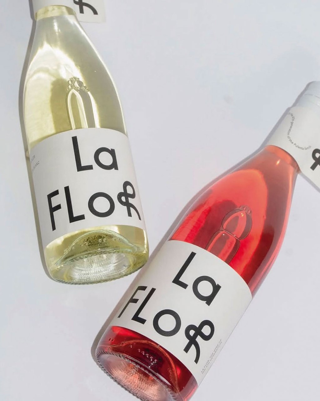 Linha Pulenta La Flor com vinhos Malbec Ros&eacute; Sauvignon Blanc e Red Blend em cena elegante