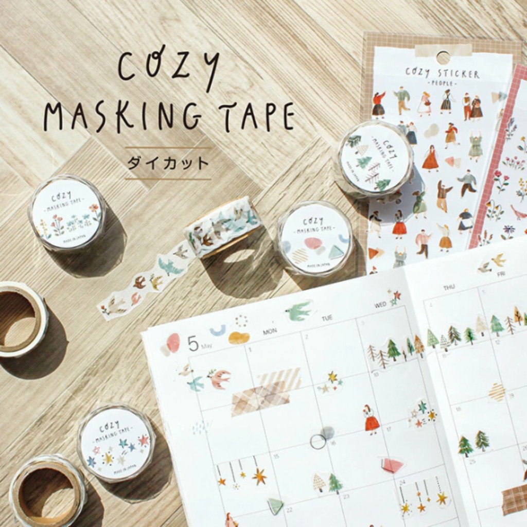 Cintas washi tape con estampados florales y geom&eacute;tricos decorando un planner.