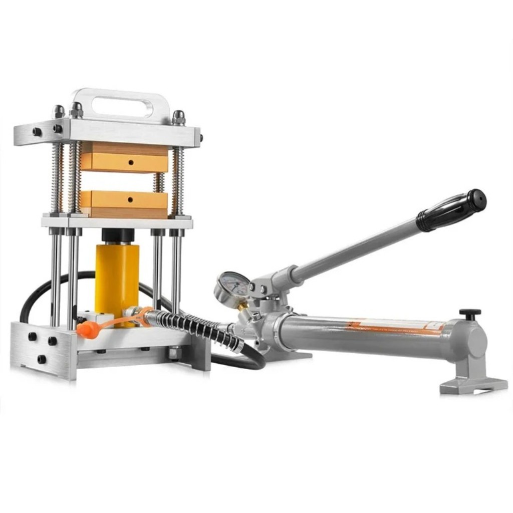 Prensa rosin hidr&aacute;ulica DABPRESS Goldrain sobre mesa de trabajo