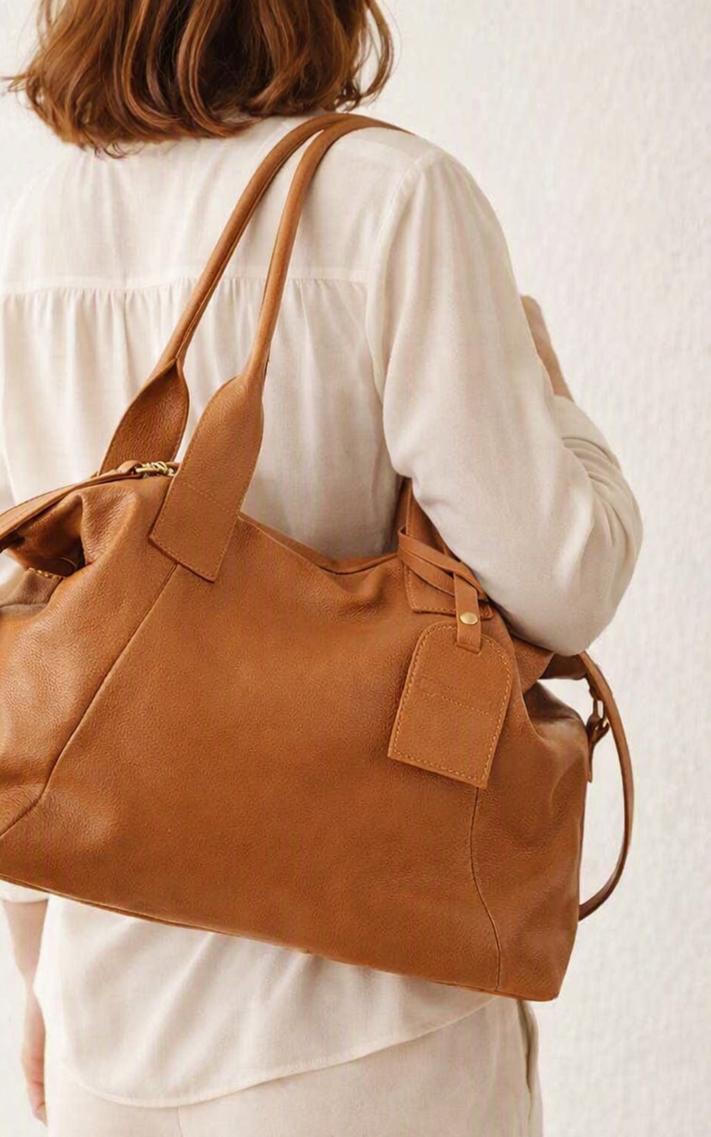 Bolsa em couro legitimo cor caramelo francarline