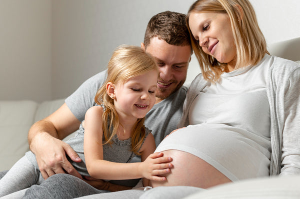 família esperando a chegada do bebê