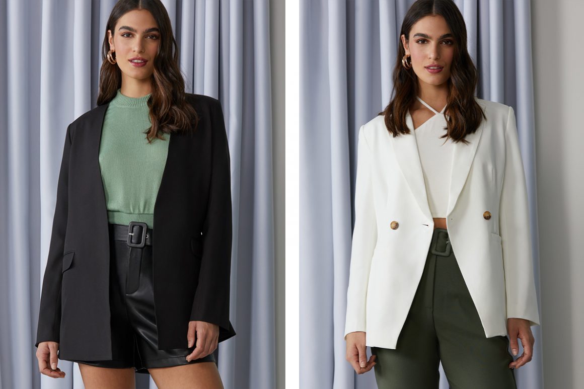 Primeira modelo vestindo blazer preto alongado e segunda modelo vestindo blazer branco